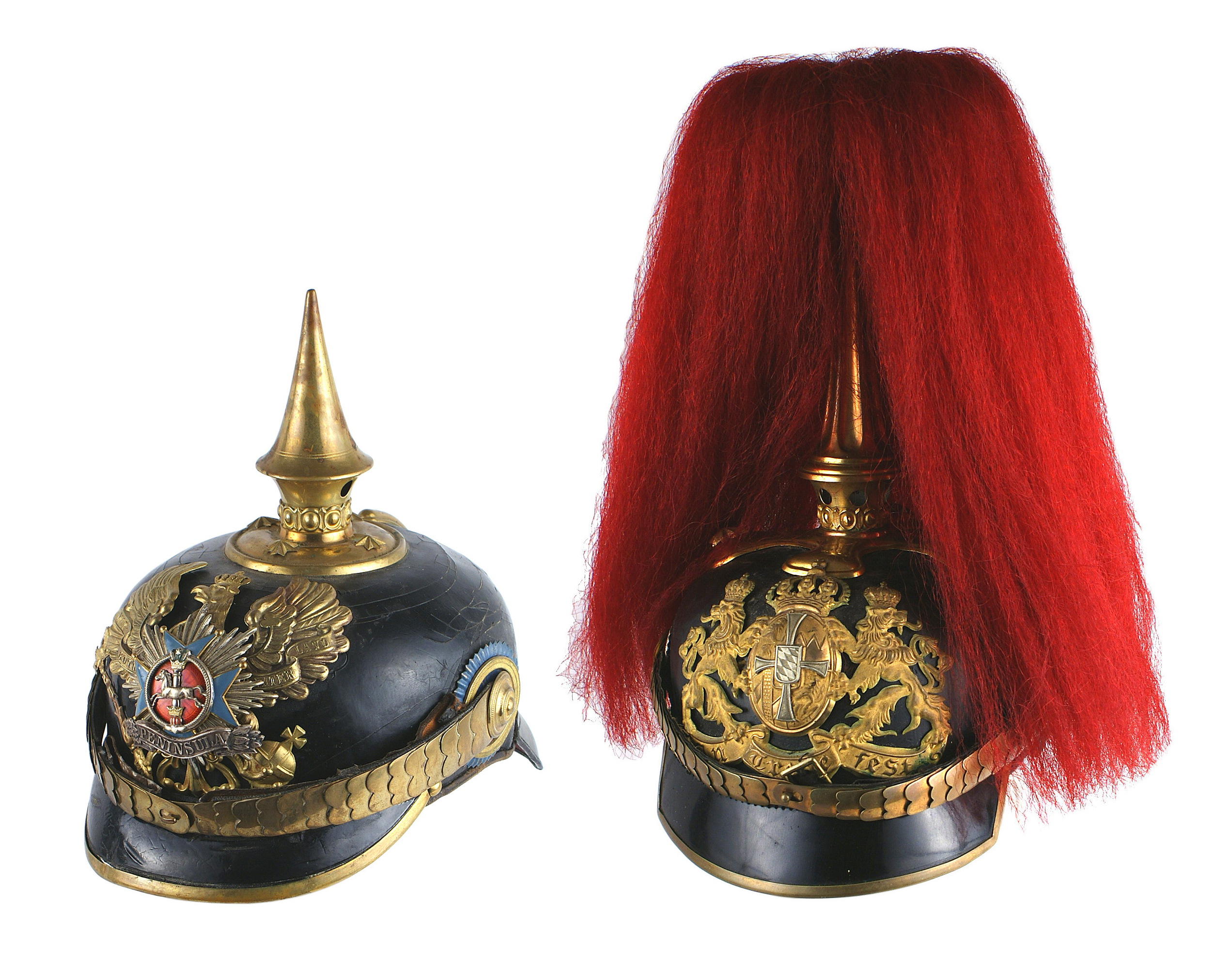 The Imperial German Brunswick 92nd Infantry Regiment, 3rd Battalion, officer's helmet (left) achieved $5,400, while the Bavarian Artillery Regiment officer's parade helmet with a red parade bush advanced to $3,120. Mohawk Arms Inc. image
