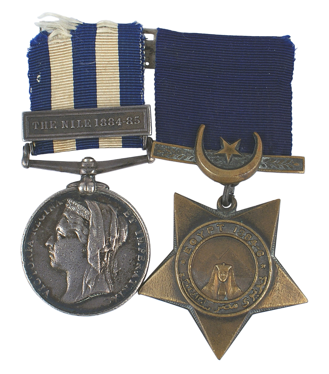 British medal bar with two medals awarded for the Sudan campaign of the 1880s, one bearing a likeness of Queen Victoria and the other showing a sphinx and pyramids. Price realized: $519. Mohawk Arms Inc. image