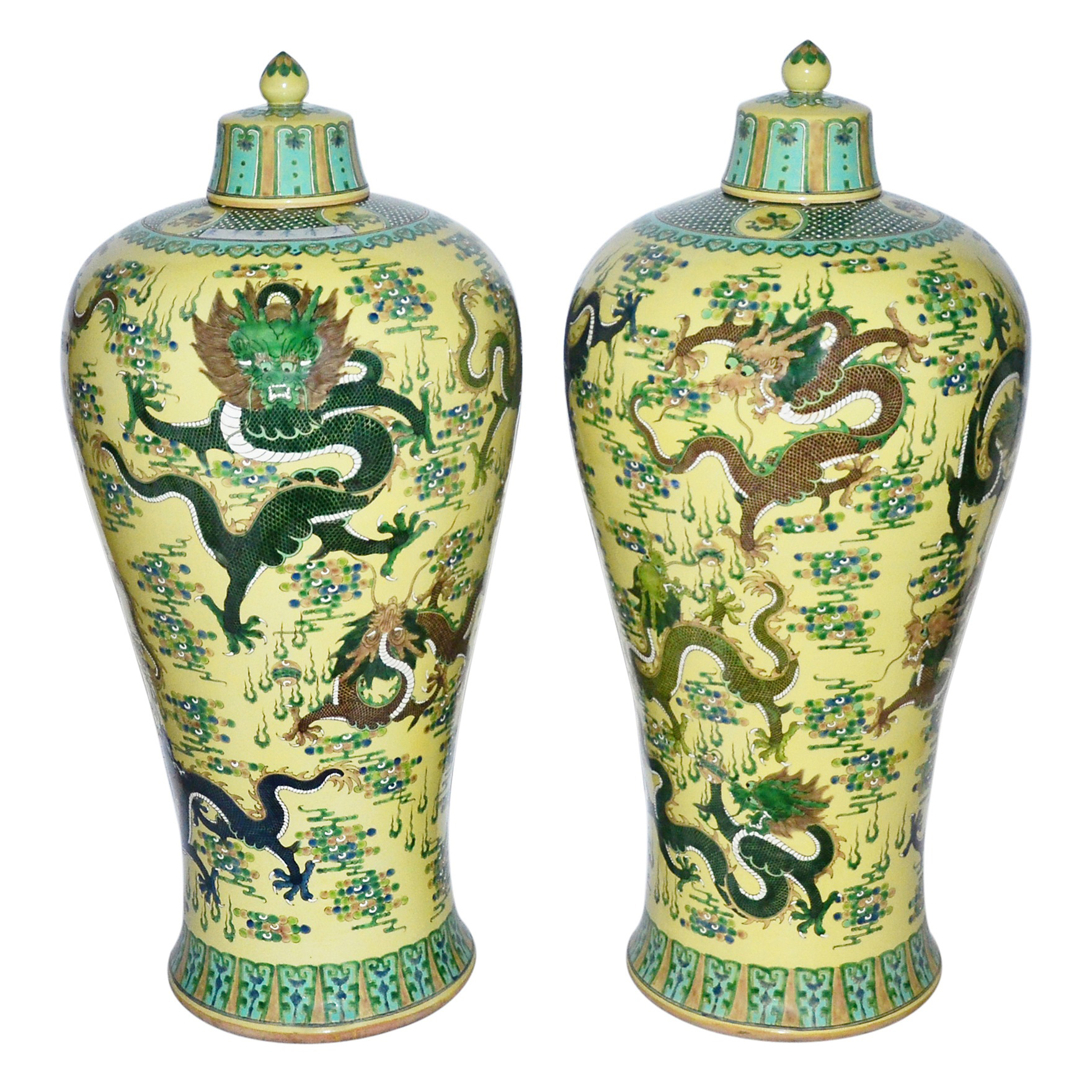An egg-yellow ground is the field upon which nine green and aubergine dragons chase on a pair of Meiping. Of the Ming Dynasty, each carries the Kangzi six-character mark. Estimate: $30,000-$40,000. Gianguan Auctions image