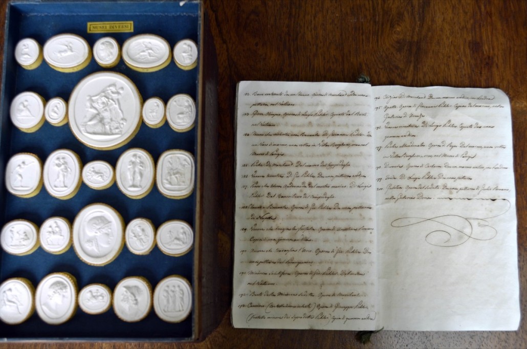 One of the trays containing some of the 200 classical plaster intaglios and reliefs. Alongside is the catalog, handwritten in Italian, describing each one. The collection sold for £2.400. Photo Ewbank’s auctioneers