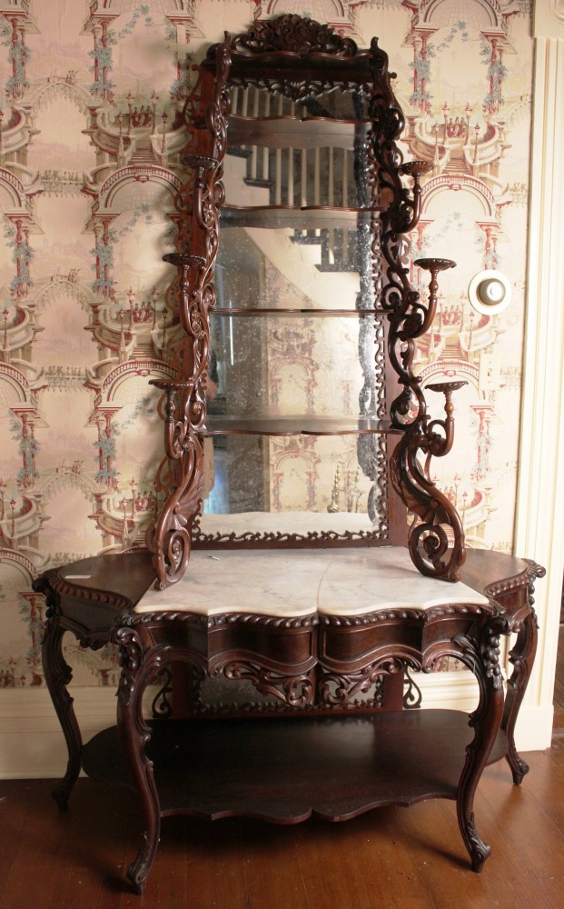 Rare rosewood étagère with dragon carving, an original furnishing from the James K. Polk home in Tennessee. Price realized: $26,450. Stevens Auction Co. image