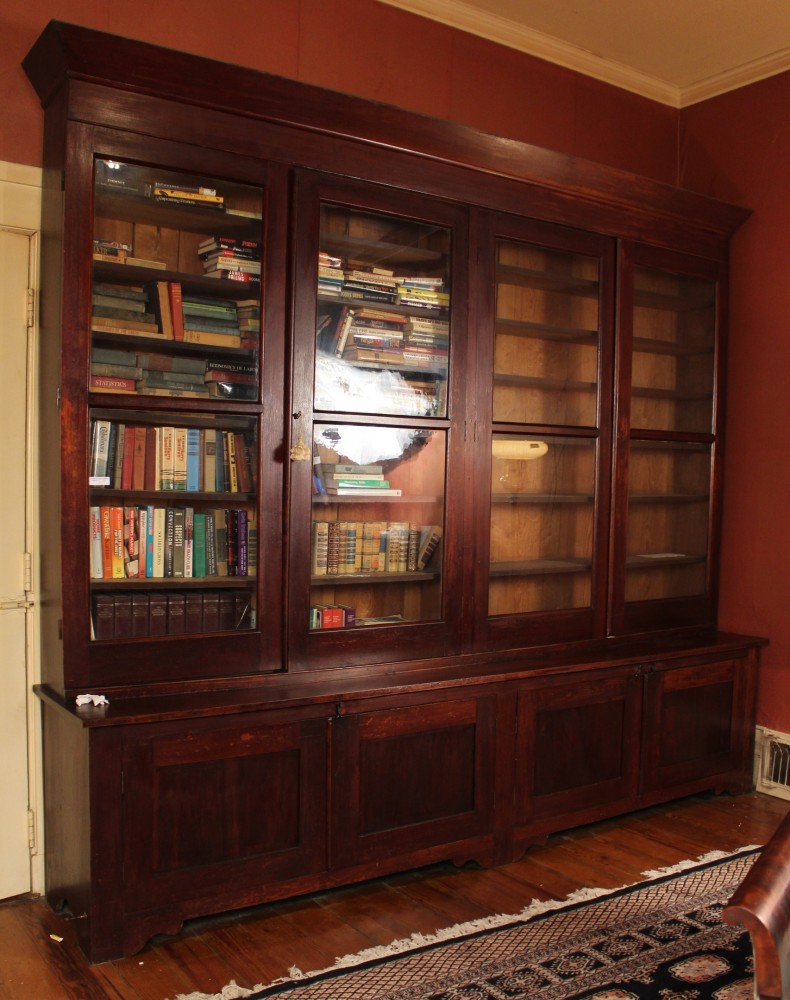 Mahogany Empire bookcase with eight doors, original to Lauri Mundi, 9 feet tall by 10 feet wide. Price realized: $10,350. Stevens Auction Co. image