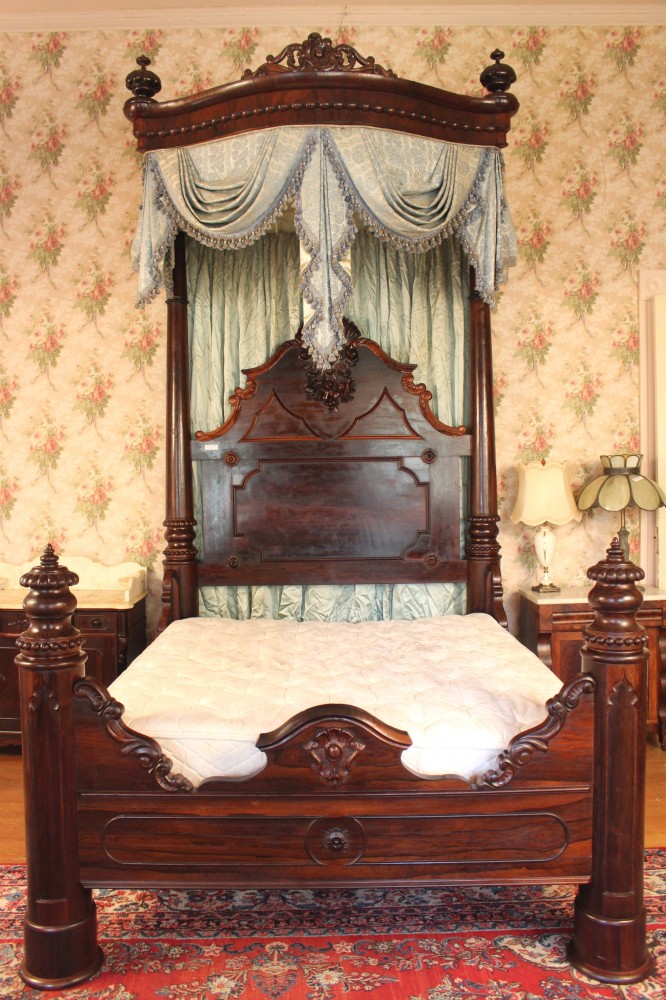 Rosewood half tester plantation bed with fine detail and carving, all original, attributed to C. Lee, circa 1850. Price realized: $17,825. Stevens Auction Co. image