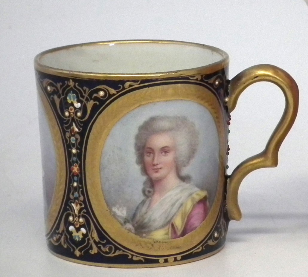A mid-19th century Sèvres coffee can painted with portraits of Marie Antoinette, Mme. Elizabeth and Mme. De Lamballe on a jeweled blue ground. It sold for £220. Photo Peter Wilson auctioneers