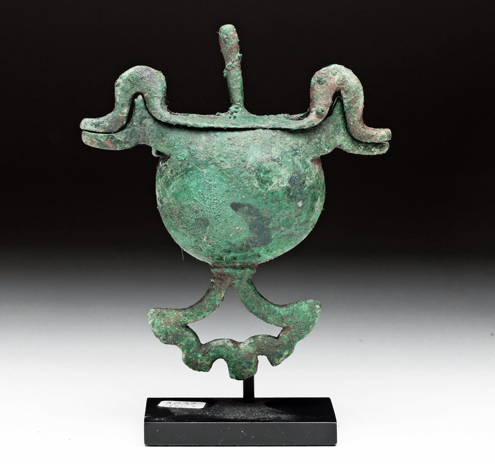 Greek geometric bronze lidded pyxis, most likely from Macedonia, Geometric Period, 8th century BCE, believed to have been used as pendants to hold perfume, est. $4,000-$5,000 