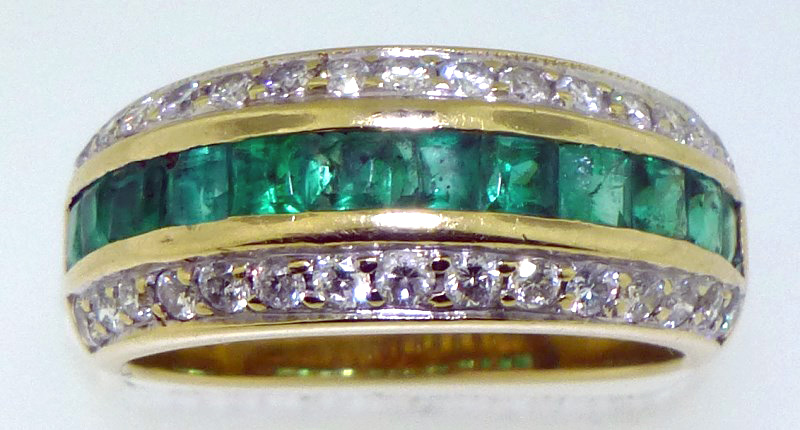 Estate diamond and emerald ring, 14K gold. Twelve channel-set, square step-cut emeralds with 15 pave-set, round brilliant-cut diamonds on either side. Est. $3,200-$4,000. Charleston Estate Auctions image 