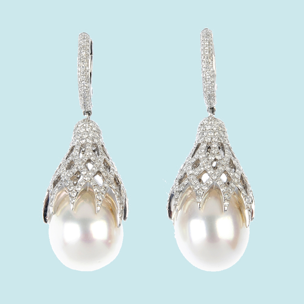 Pair of South Sea cultured pearl and diamond ear pendants. Fellows image