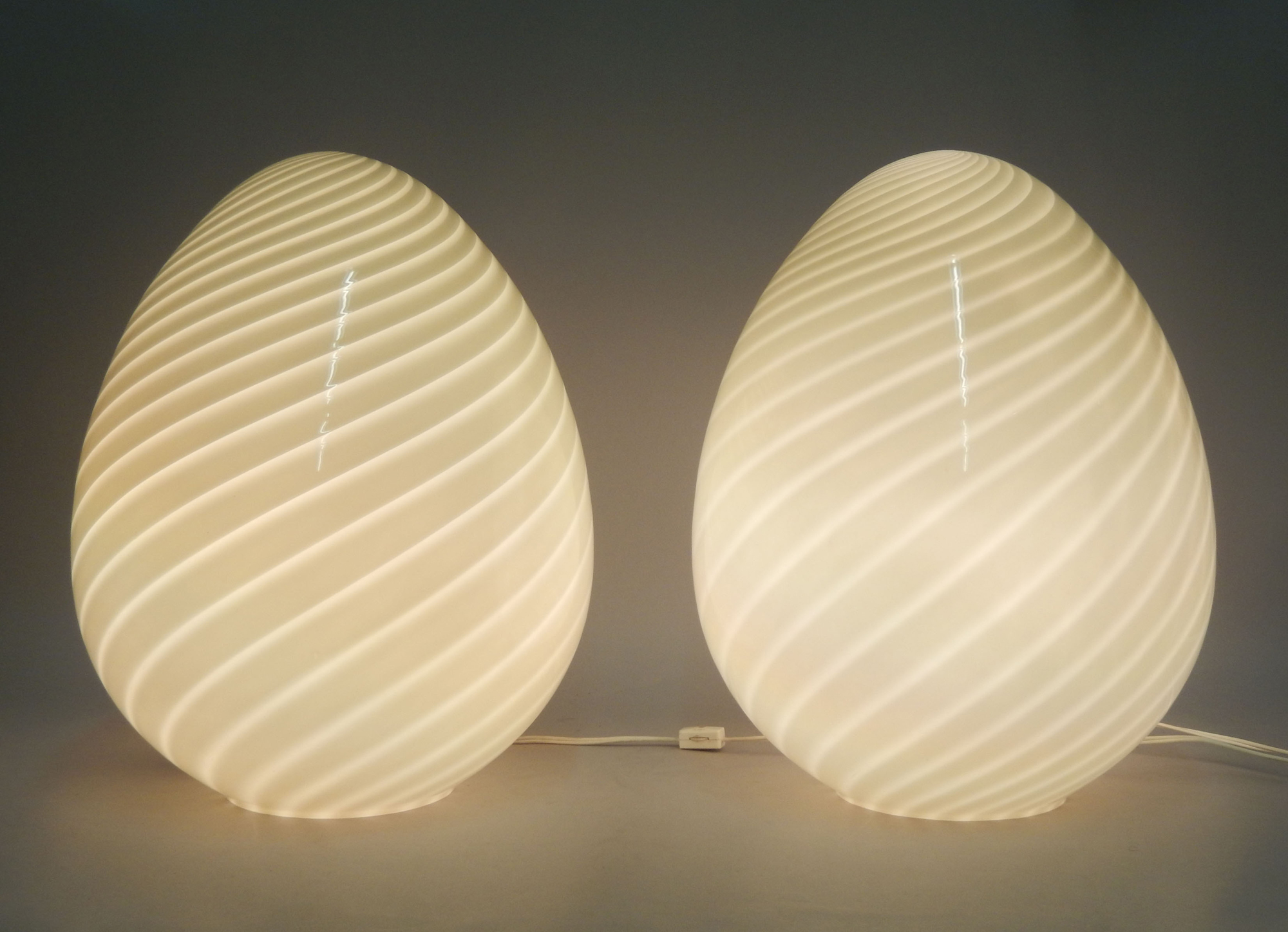 Pair of midcentury Murano egg-shape glass lamps. Stephenson’s Auctioneers