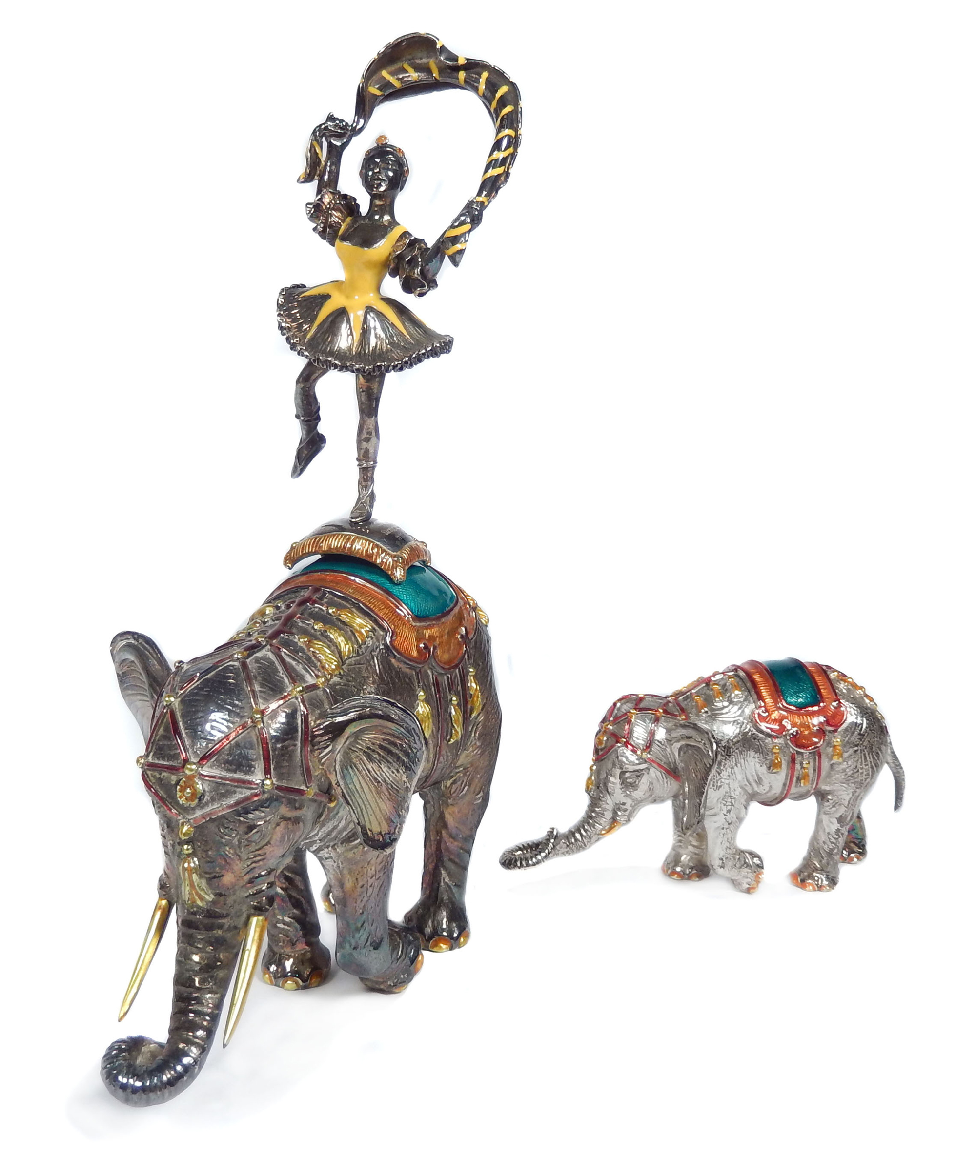 Close-up view of large and small enameled silver elephants from the Tiffany & Co. 21-piece Circus set. No reserve. Stephenson’s Auctioneers image