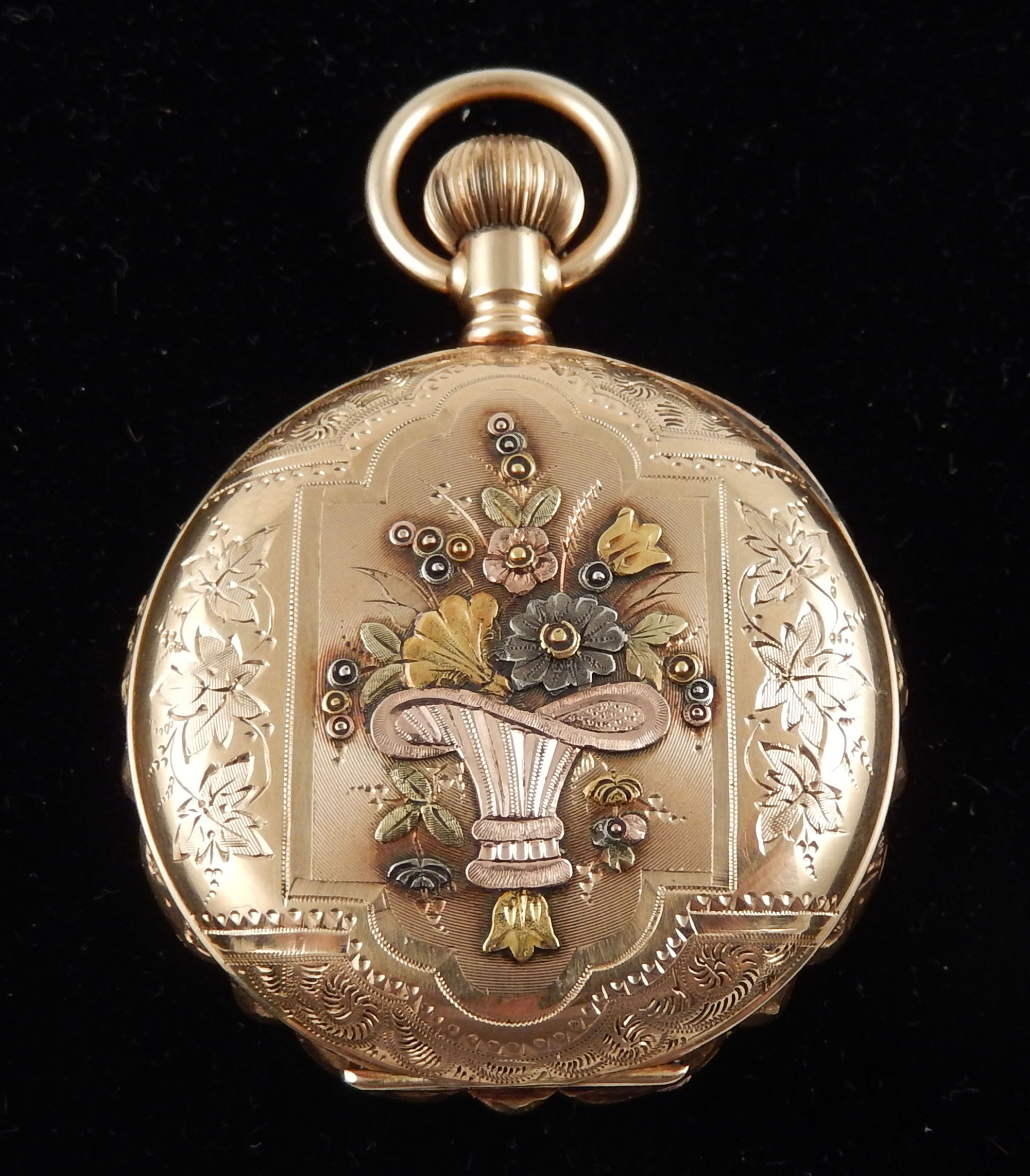14K gold 4-color hunting pocket watch. Stephenson’s Auctioneers