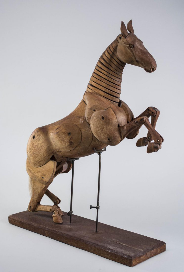 Artist's model of a horse, wood with articulated joints and adjustable stand. Sold for $1,320.
