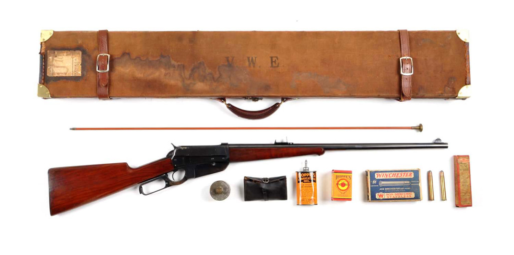 English-cased, dealer-marked 1895 Winchester .405 caliber rifle, manufactured in 1921, of a type made famous by Teddy Roosevelt, est. $9,500-$12,500.