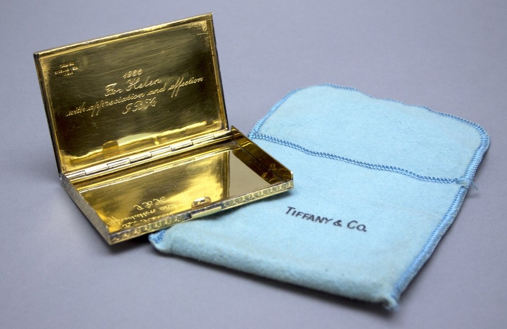 Tiffany & Co. gold vermeil over sterling cigarette case inscribed in 1966 by Jacqueline Kennedy to parting staffer Helen Lempart, est. $500-$800. Waverly image 