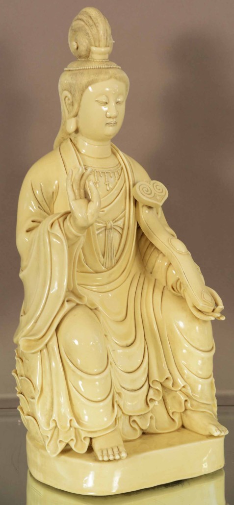 Antique Chinese blanc-de-chine statue, circa 1910, 21in high x 10in wide. Bruhns Auction Gallery image