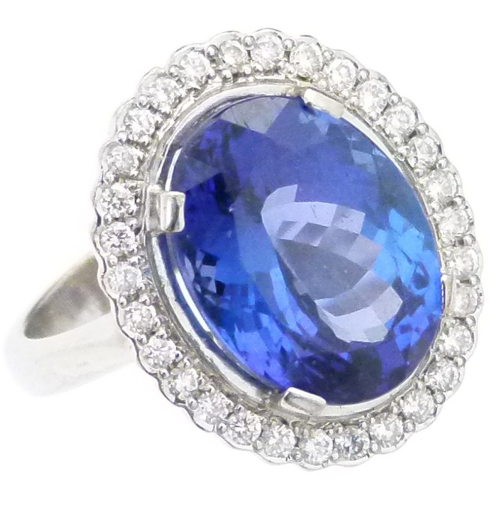 Gem-5A tanzanite and diamond oval cluster ring, the central mixed cut stone surrounded by 30 brilliant diamonds, all set in 18ct white gold, sold for £1,500. Photo Peter Wilson auctioneers