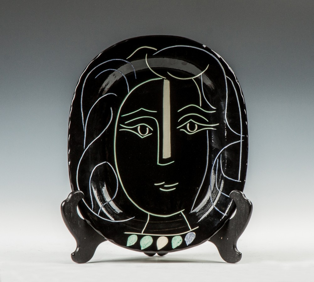 Pablo Picasso (1881-1973), pottery plate, ‘Woman’s Face.’ Price realized: $25,300. Cottone Auctions image