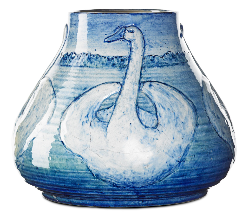 Lot 100: Leona Nicholson (1875 - 1966), Newcomb College, vase with swans, New Orleans, 1901; 9 1/2in x 11in. Estimate: $45,000–$65,000. Rago Arts and Auction 