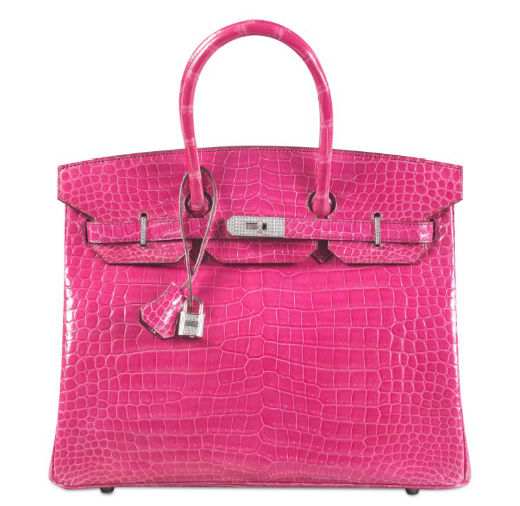 Gilding the lily, this Shiny Fuchsia Porosus Crocodile Birkin 35cm has a catch and padlock of 18K white gold, studded with diamonds. The over-the-top handbag sold for $222,928 (HK $1,720,000) in a 2015 Christie’s Hong Kong sale. Courtesy Christie’s