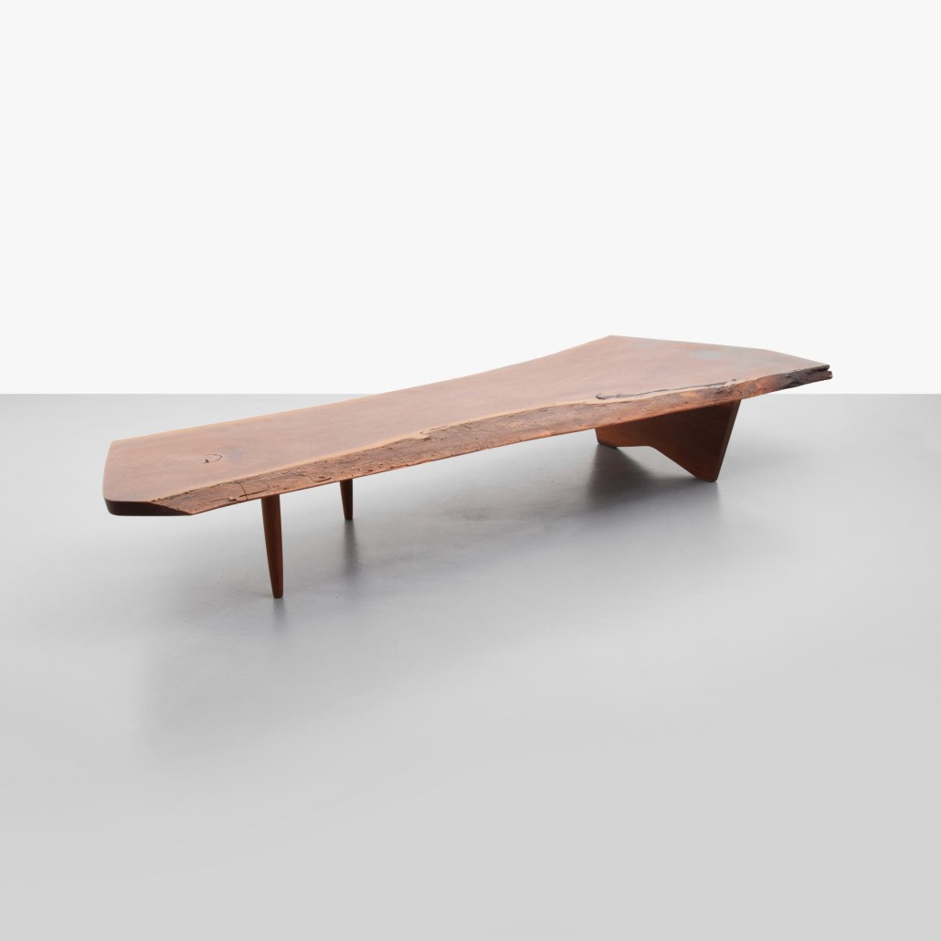 George Nakashima walnut coffee table, circa 1960, 85 inches wide, est. $20,000-$30,000