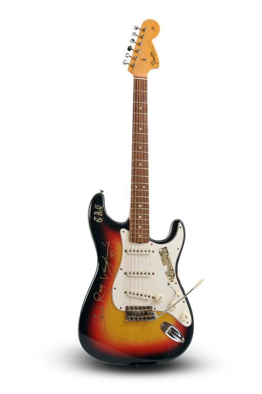 Stevie Ray Vaughan owned and signed Fender Stratocaster in a three-tone Sunburst finish, circa 1966-67. Estimate: $250,000-$500,000. Guernsey’s image