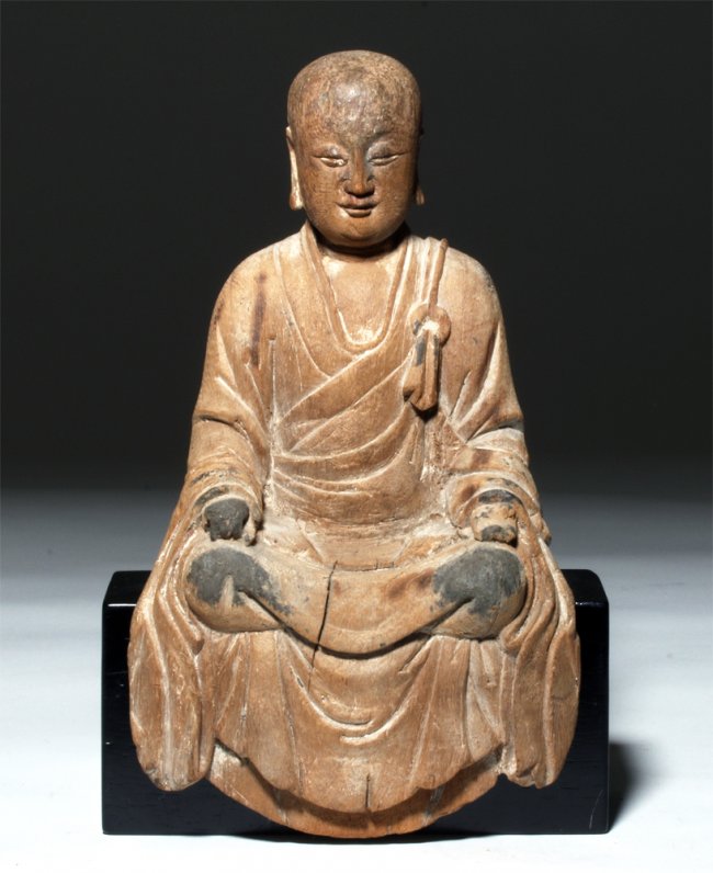 China, Qing Dynasty, early 18th century, finely carved wooden Lohan or Arhat, seated in the mediation pose and wearing a flowing monk's robe. Estimate: $1,000-$1,500. Artemis Gallery image