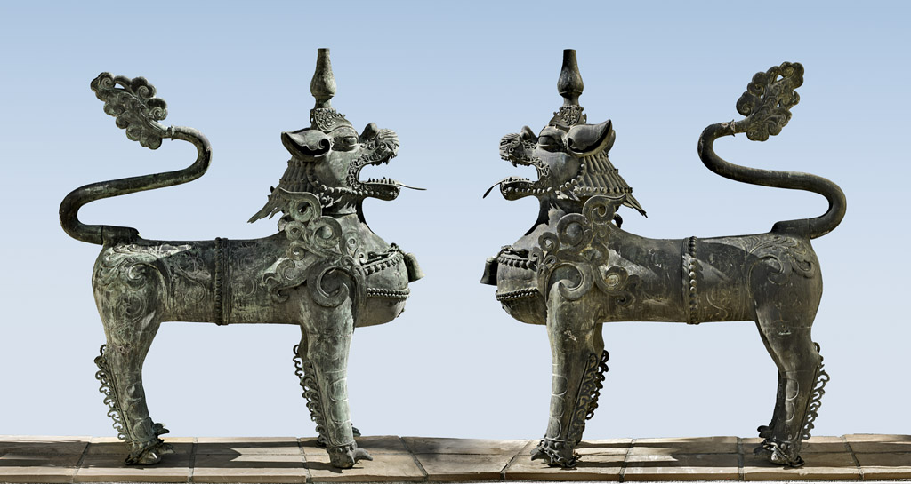 Pair of massive 17th-century Chinese bronze palace lions, each approximately 5 feet tall. Est. $60,000-$80,000 (pair)