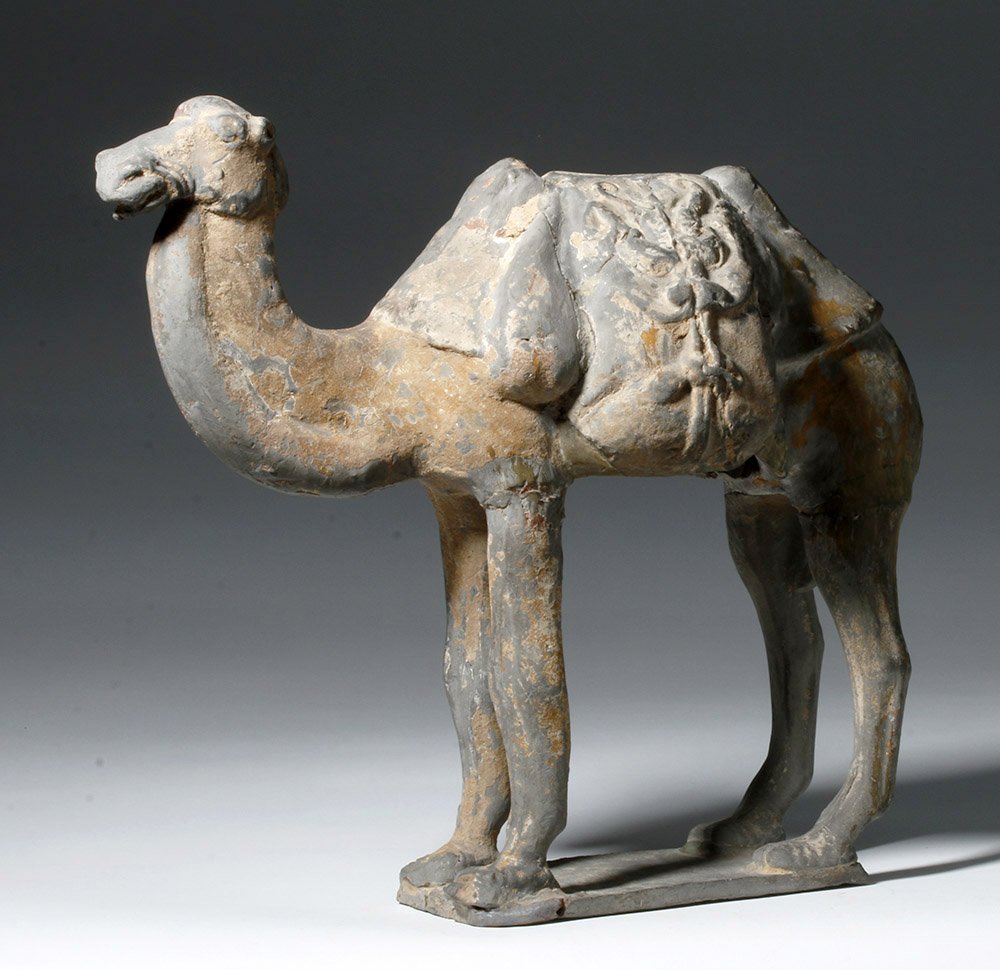 Chinese Tang Dynasty (circa 618-907 CE) pottery figure of Bactrian camel with molded harness and saddlebags, ex Denver Art Museum, est. $4,000-$6,000