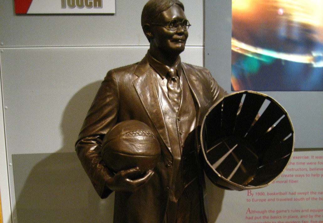 Statue of James Naismith, the inventor of basketball, at the Basketball Hall of Fame and Museum in Springfield, Mass. Image by Randomduck. This file is licensed under the Creative Commons Attribution-Share Alike 2.0 Generic license.