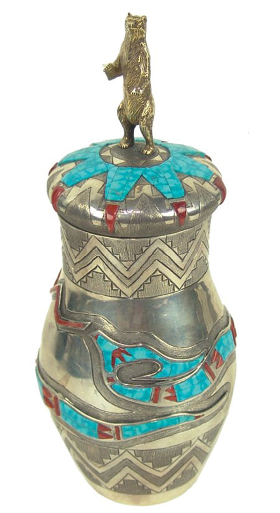 Circa 1980s White Buffalo lidded sterling and gold jar with fine etched designs, 8 1/2 inches tall. Estimate: $5,000-$10,000. Allard Auctions image 