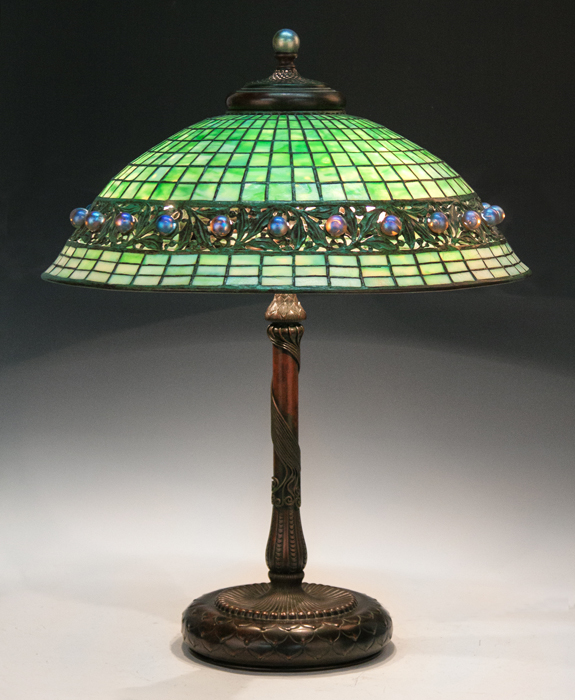 A fine grouping of Tiffany lamps was led by this leaded glass, bronze and glass ball lamp. Price realized: $72,450. Cottone Auctions image 