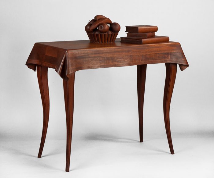 Fine and rare stack laminated walnut trompe l’oeil table crafted in 1978 by Wendell Castle (American, b. 1932), signed and dated. Price realized: $51,750. Cottone Auctions image 