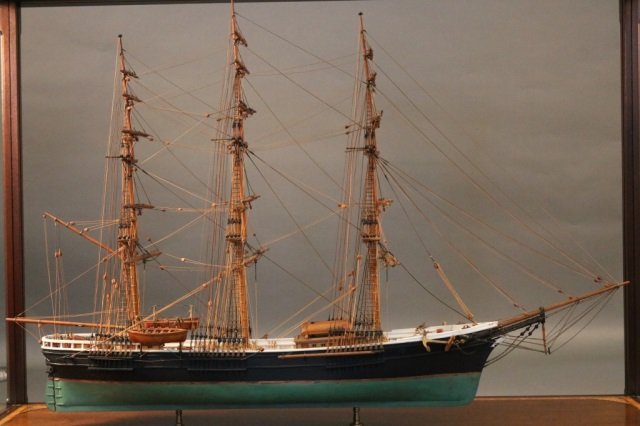 Peter Ness handmade ship model, Sovereign of the Seas, 1960s, mounted into a mahogany display case with satinwood inlay and table. Estimate $15,000-$20,000. Boston Harbor Auction image 