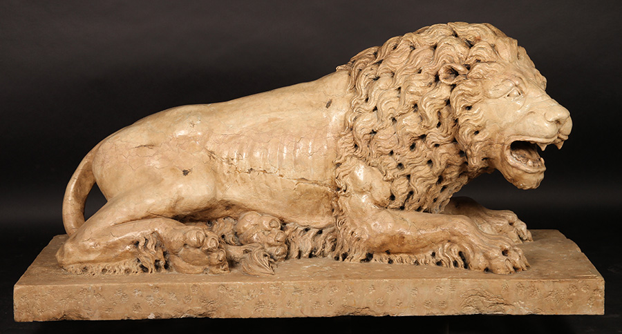 Pair of carved Rosa Verona marble recumbent lions on raised platform bases, 36 1/2in x 30in x 73in. Estimate: $25,000-$35,000. Kamelot Auctions image 