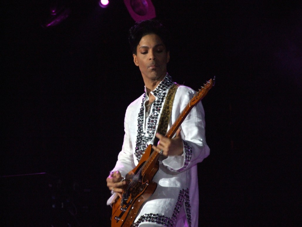 Prince performing at Coachella 2008. Photo by Penner, licensed under the Creative Commons Attribution-Share Alike 3.0 Unported license.