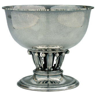 A Jensen silver center bowl, with pedestal base and leaf-and-berry openwork supports, sold in 2005 for $3,400. Image courtesy Brunk Auctions.