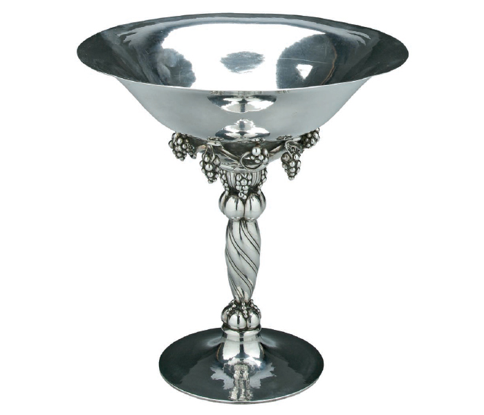 This sterling compote bowl, with a spiral twist stem and grape clusters, was designed by Georg Jensen between 1926 and 1932. It sold at auction for $9,000 in September 2007. Courtesy of Brunk Auctions.