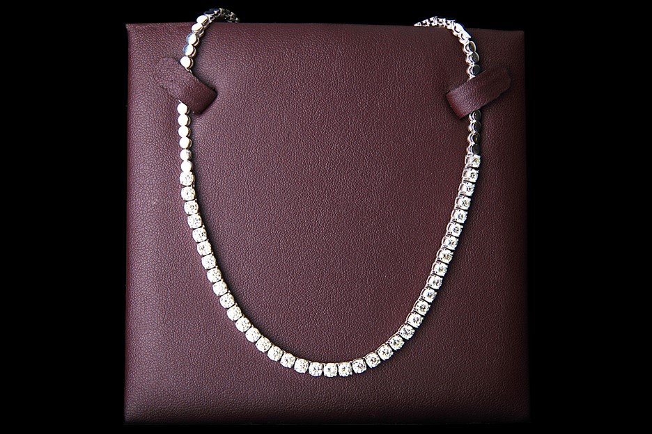Fourteen-karat white gold Riviera diamond necklace with 38 round single cut diamonds, approximately 7.51 carats. Estimate: $15,700-$20,450. Cairo Auction House image