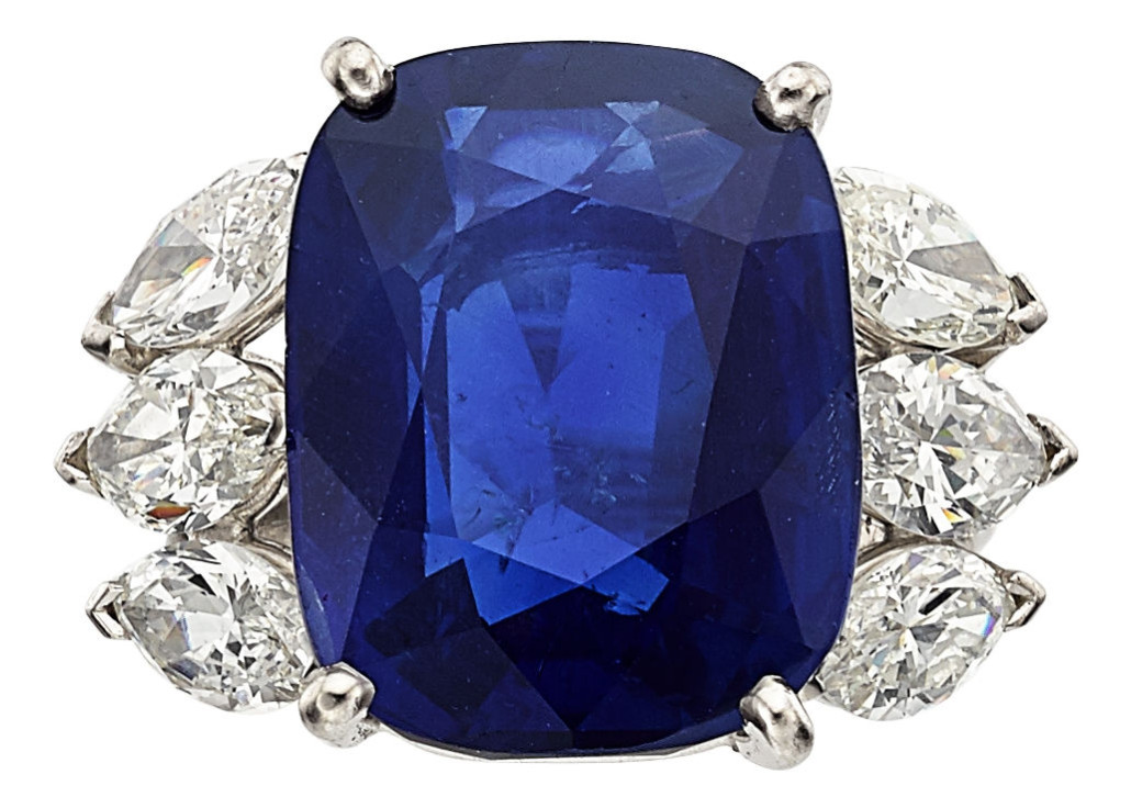 Burma sapphire, diamond, platinum ring featuring a cushion-shaped sapphire weighing 14.62 carats and enhanced by marquise-shaped diamonds. Price realized: $52,500. Heritage Auctions image 