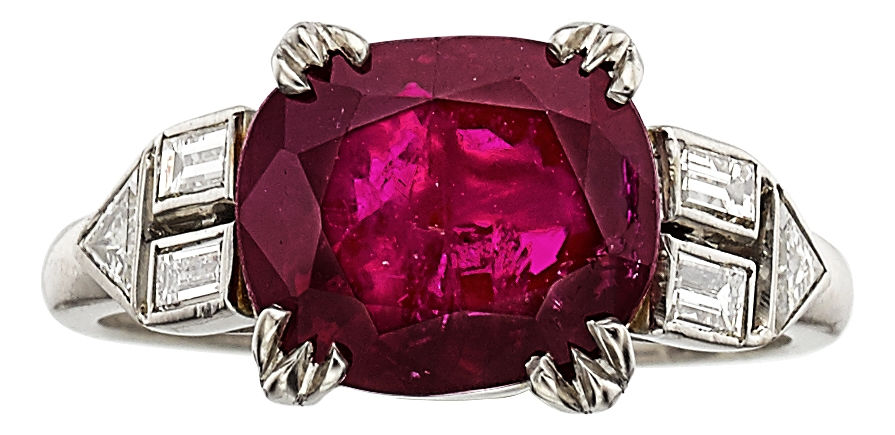 Art Deco Burma ruby, diamond, platinum ring featuring oval-shape ruby weighing 5.39 carats, enhanced by baguette-cut diamonds. Price realized: $52,500. Heritage Auctions image