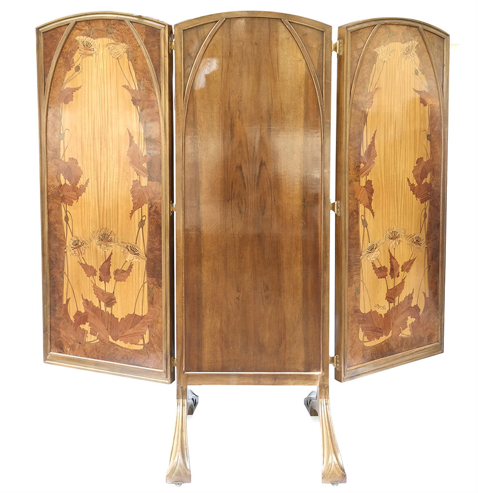 Louis Majorelle triptych mirror in robustly carved walnut frame and with original beveled looking glasses, 88 1/2 inches long x 82 3/4 inches high. Estimate: $30,000-$40,000. Roland Auctions N.Y. image