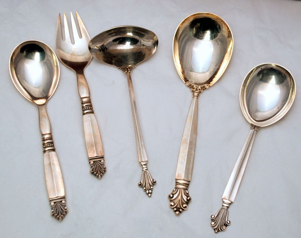 Some serving pieces from a 137-piece Georg Jensen sterling silver Acanthus flatware set. Estimate: $18,000-$24,000. Last Chance by LiveAuctioneers image