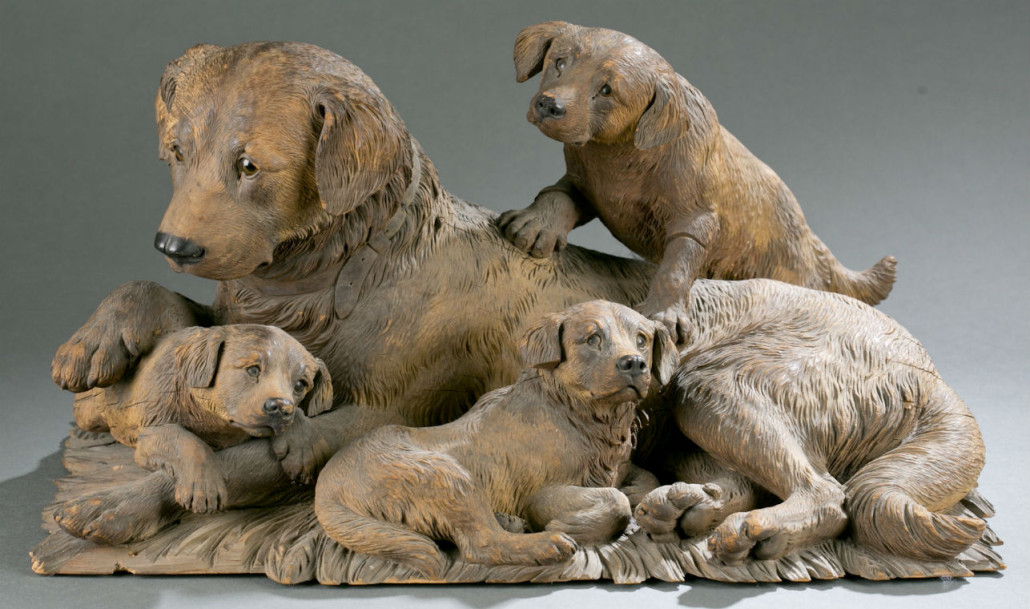 Walter Mader (Swiss, active late 19th/early 20th century), Black Forest carved wood sculpture of mother dog with pups, est. $8,000-$12,000. Quinn's Auction Galleries image