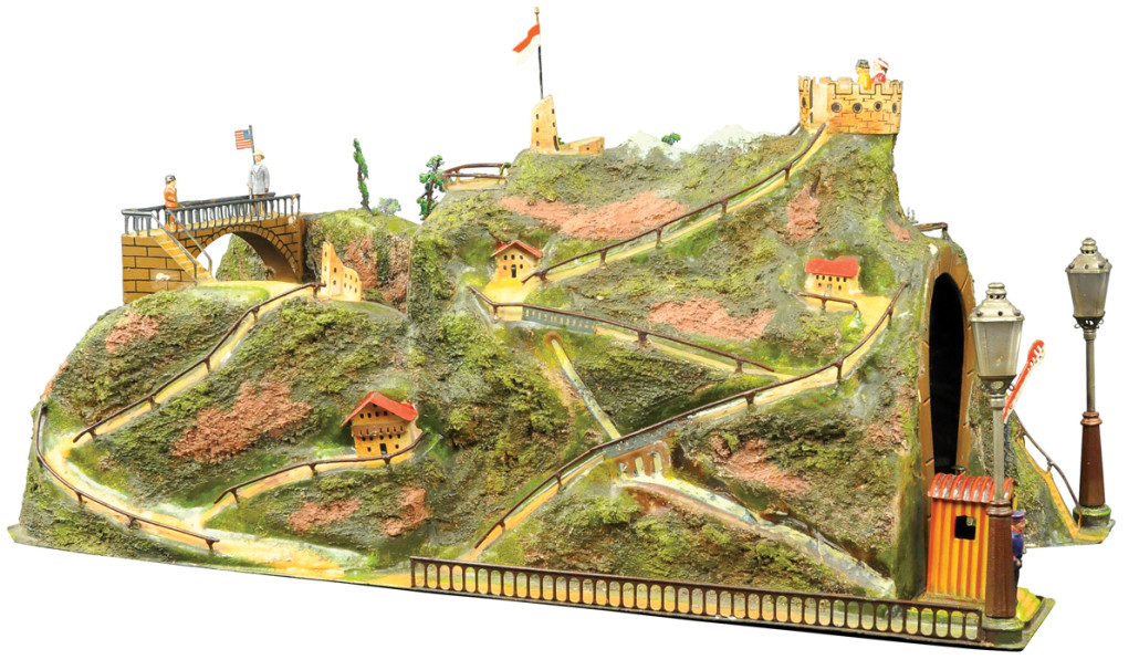Marklin tunnel with mountain castle tower, railed base, perfectly scaled and hand-painted, 29in wide x 13in high. Price realized: $84,000.