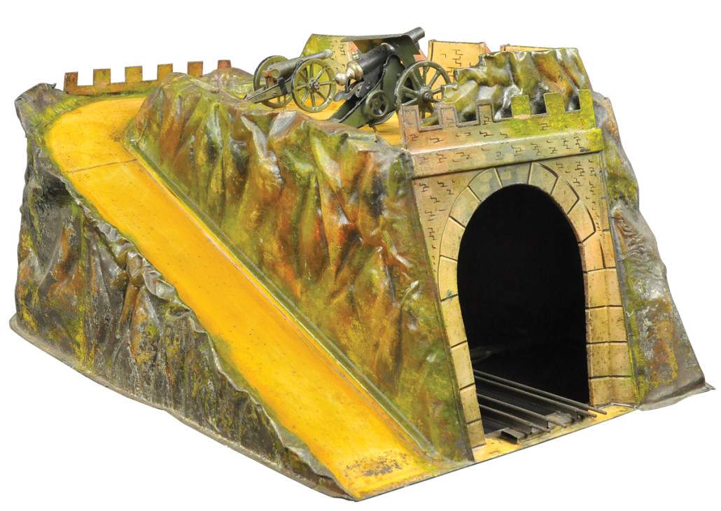 Rare Marklin tunnel with cannon battery, hand painted tin, 26 1/2in long x 12 1/2 in high. Price realized: $27,000. 