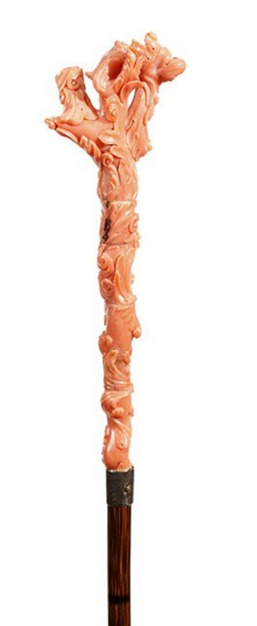 Italian pink coral cane handle, circa 1870, carved throughout in a swirl pattern. The top of the five-piece segmented handle is carved to depict tree branches. With partridgewood shaft and a brass ferrule. Estimate: $7,000-$8,000. Kimball M. Sterling Inc. image