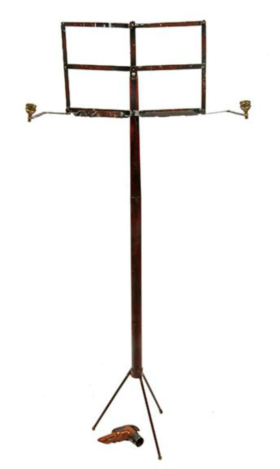Rare system cane having a carved wood dog handle and containing a music stand – a 19th century engineering masterpiece. Estimate: $4,000-$6,000. Kimball M. Sterling Inc. image