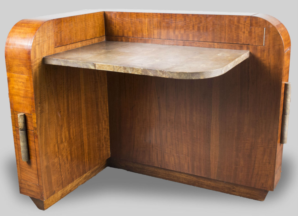 This Art Deco desk features a shagreen writing surface and various hidden drawers and fitted compartments. Estimated value $2,000-$3,000. Capo Auction image