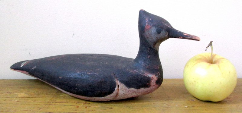 Merganser decoy, 11 1/8in x 4½in. Estimate: $400-$800. Last Chance by LiveAuctioneers image