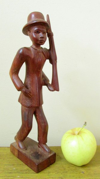 Carved Hunter, 10in high. Estimate: $300-$600. Last Chance by LiveAuctioneers image