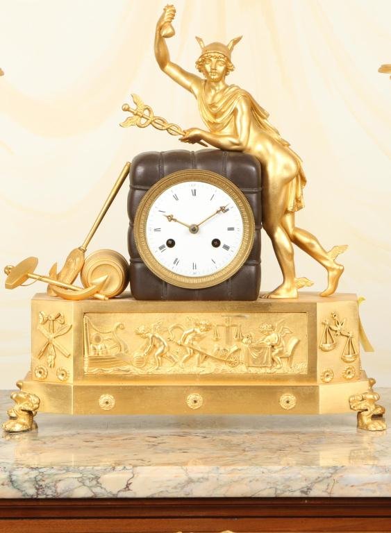 Nineteenth century French Empire gilt bronze figural clock, in two-color bronze with a beautiful gilt surface and with a figure of Mercury. Estimate: $1,200-$1,800. John McInnis Auctioneers image